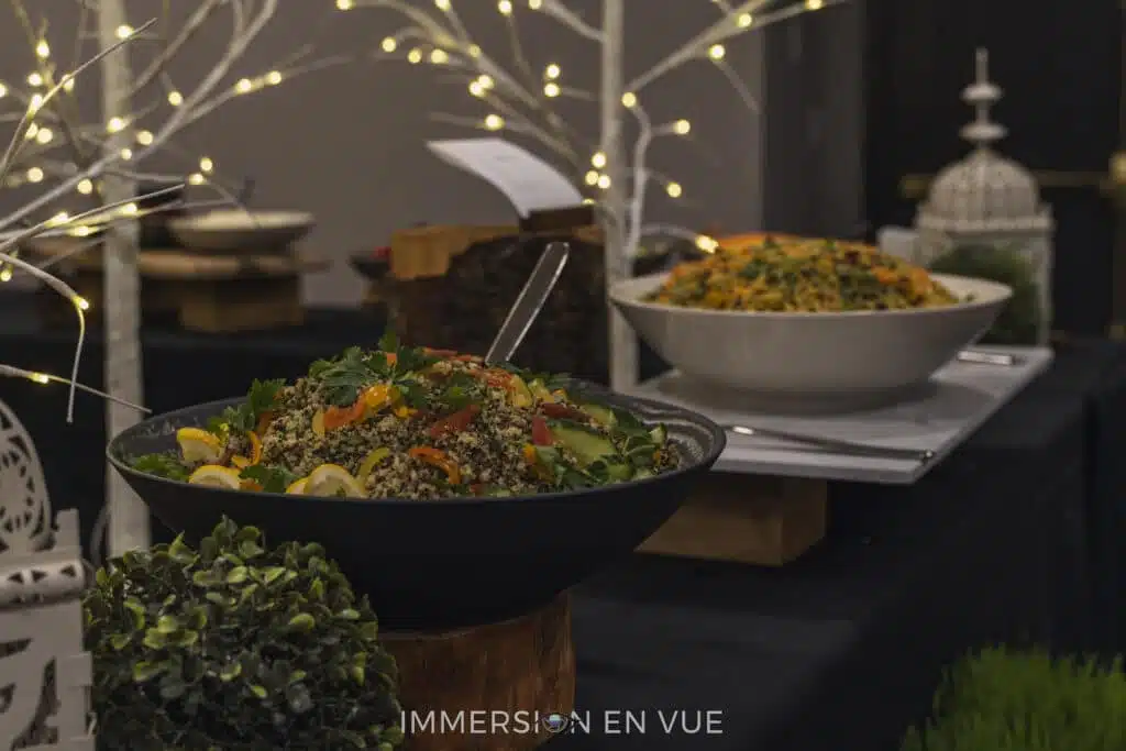 A professional catering food buffet table prepared for attendees at a business conference