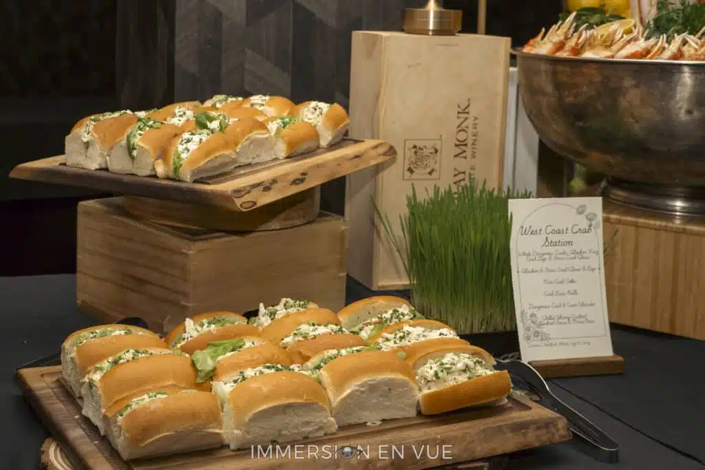 A variety of fresh food arranged on a buffet table for a corporate conference catering opening reception